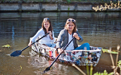 Een papieren boot als symbool voor mogelijkheden